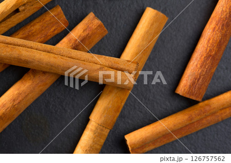 Cinnamon spice macro closeup detail on black 126757562