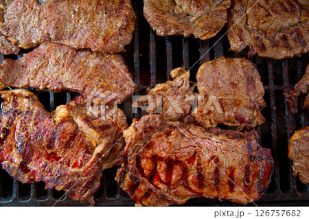 Beef meat barbecue grilled with embers and smoke Beef meat barbecue grilled with embers and smoke 126757682