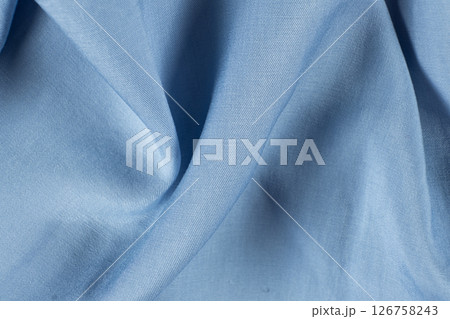 Polyester fabric with a little elastane, macro texture top view. Polyester fabric with a little elastane, macro texture top view. 126758243