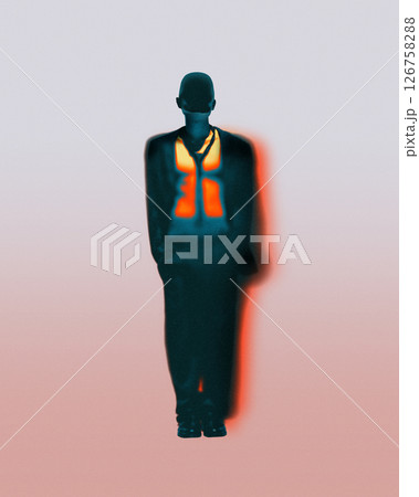 Silhouetted male in suit with bright orange glowing vest stands still in red gradient. 126758288