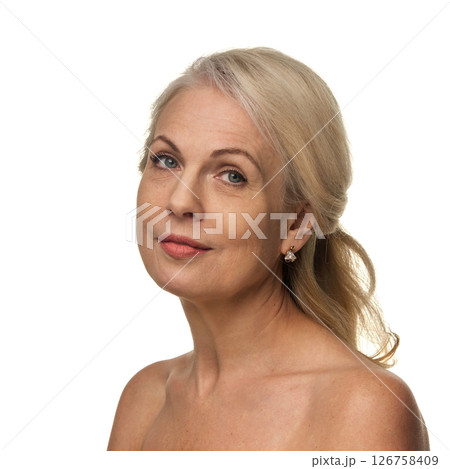 Portrait of elegant woman in 50s, with confident expression and soft makeup, looking straight with grace and relaxed expression against white backdrop Portrait of elegant woman in 50s, with confident expression and soft makeup, looking straight with grace and relaxed expression against white backdrop 126758409