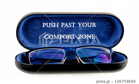 Familiarity, habits, discovering, challenge, uncertainty concept. Words PUSH PAST YOUR COMFORT ZONE Familiarity, habits, discovering, challenge, uncertainty concept. Words PUSH PAST YOUR COMFORT ZONE 126758699