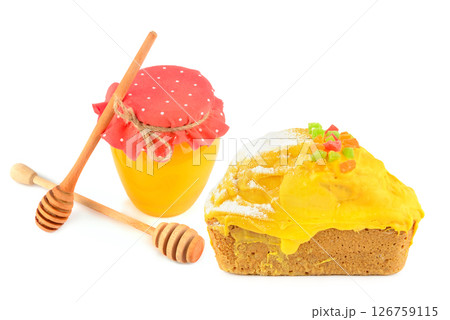 Cupcake honey and a jar of honey isolated on white. Collage. Free space for text. 126759115