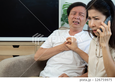 Elderly Wellness and Support. Couple in distress during a medical emergency. 126759975