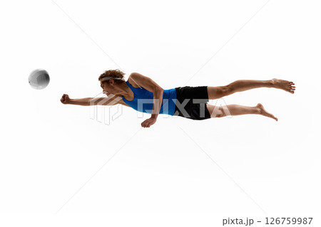 Young man, sportsman, player bends knees and stretches arms to catch volleyball with full attention and readiness against white studio background 126759987