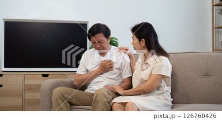 Wellness and Support. Elderly couple addressing health concerns at home. 126760426