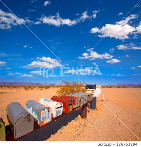 Grunge mail boxes in California Mohave desert USA 126763194