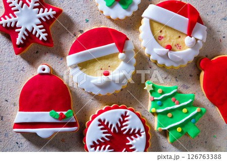Christmas cookies Xmas tree Santa snowflake on recycled paper Christmas cookies Xmas tree Santa snowflake on recycled paper 126763388