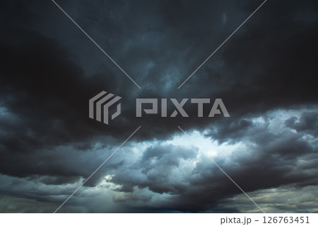 Stormy clouds gray sky with dramatic shadows Stormy clouds gray sky with dramatic shadows 126763451