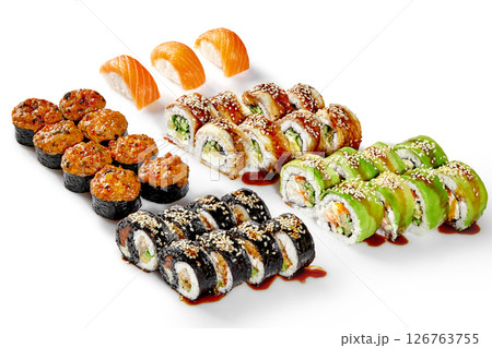 Sushi set presenting variety of delicious japanese food with salmon, eel, avocado and sesame seeds 126763755