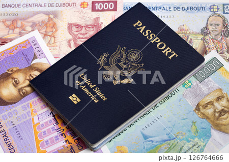 American passport on a Djiboutian money 126764666