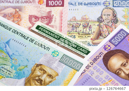 American Permanent Resident Card on a Djiboutian money American Permanent Resident Card on a Djiboutian money 126764667