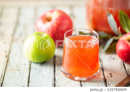 Glass of fresh apple juice Glass of fresh apple juice 126766604