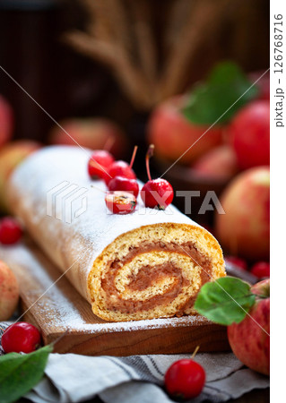 Homemade fresh baked delicious apple sponge roll cake 126768716