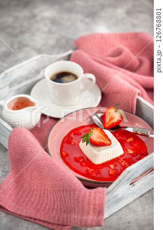 Delicious Italian dessert Panna Cotta with strawberry sauce and fresh berries Delicious Italian dessert Panna Cotta with strawberry sauce and fresh berries 126768801