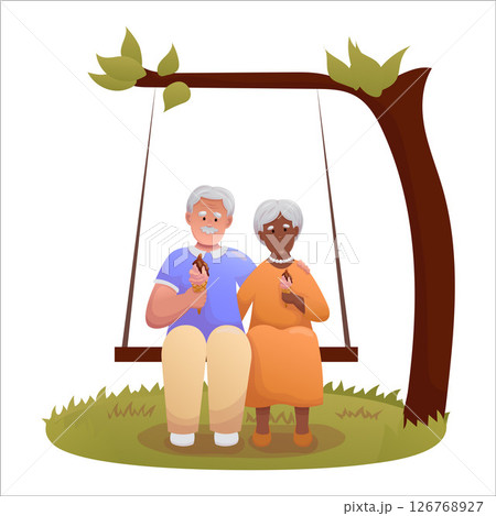 Cute elderly couple swinging on swing. Happy seniors spending time outdoors together 126768927