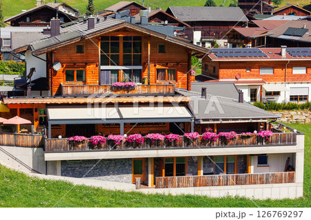 Scenic aerial alpine view austrian mountain village Kals am Grossglockner valley green rural farmland meadow horse pasture background. Austria Alp osttirol National park nature. Summer hiking tourism 126769297