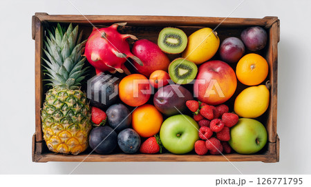 Colorful assortment of fruits in a wooden box 126771795
