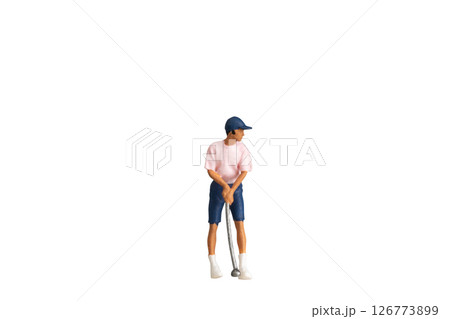 Miniature Golfer Figurine with Club isolated on white background with clipping path Miniature Golfer Figurine with Club isolated on white background with clipping path 126773899