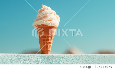 Delicious ice cream cone against clear blue sky 126773975