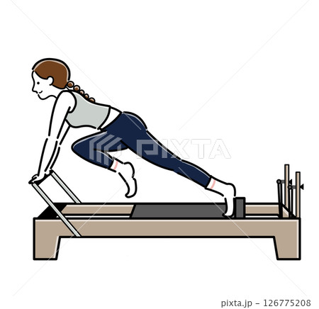 マシンピラティスで膝のストレッチを行う女性 マシンピラティスで膝のストレッチを行う女性 126775208
