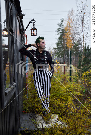 An Eclectic Fashion Portrait Captured Beautifully in an Autumn Setting with Vibrant Colors 126775259