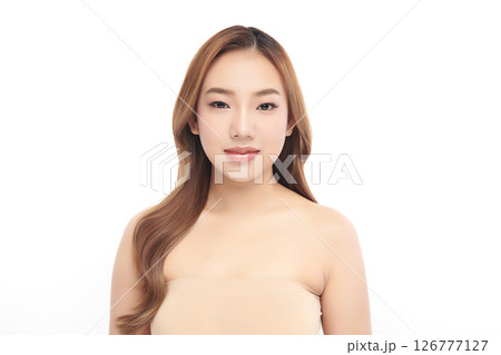 A beautiful young Asian woman with clean, fresh skin against a white background. Skincare, facial treatment, cosmetology, beauty, and spa. An elegant portrait of an Asian woman. A beautiful young Asian woman with clean, fresh skin against a white background. Skincare, facial treatment, cosmetology, beauty, and spa. An elegant portrait of an Asian woman. 126777127