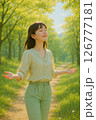 春の新緑の中で深呼吸する女性（リフレッシュ・癒し） 126777181