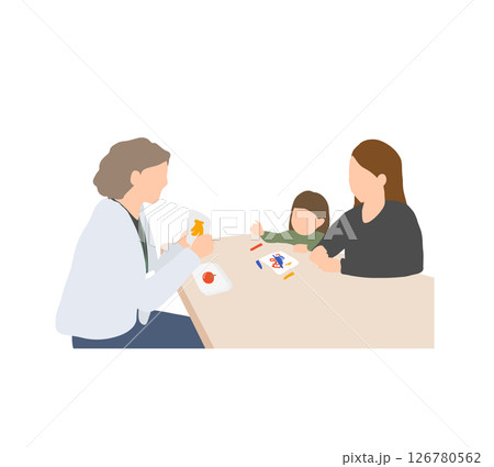 発達支援・療育面談のイラスト｜支援者が絵カードを提示し、子どもが関心を示すシーン（女児） 126780562