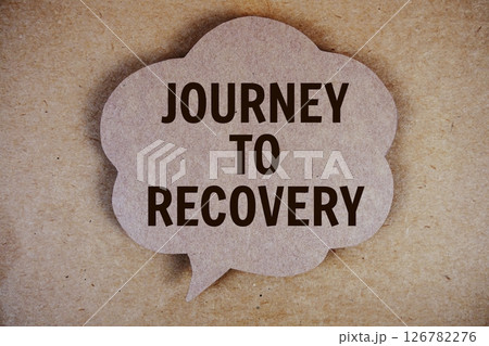 Journey to Recovery text with speech bubble on paper craft background Journey to Recovery text with speech bubble on paper craft background 126782276