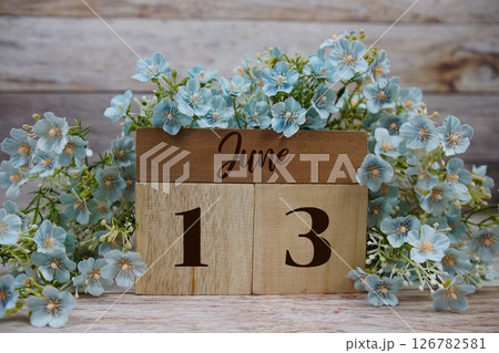 Wooden Calendar Showing the Date of June 13th. Day 13 of Wooden Calendar Showing the Date of June 13th. Day 13 of 126782581