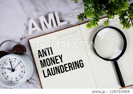 AML - Anti Money Laundering acronym on notepad, Business concept background 126783064