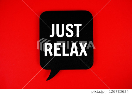 Just Relax text with speech bubble on red background Just Relax text with speech bubble on red background 126783624