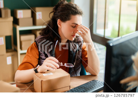 Woman working in a warehouse 126785797