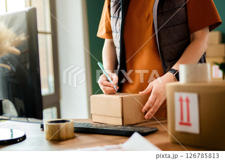 Woman working in a warehouse 126785813