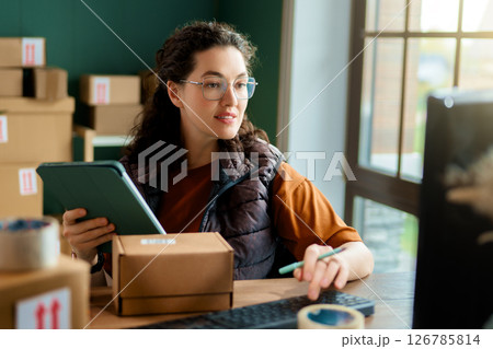 Woman working in a warehouse 126785814