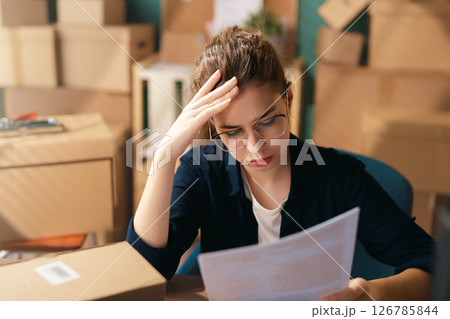 Woman working in a warehouse 126785844