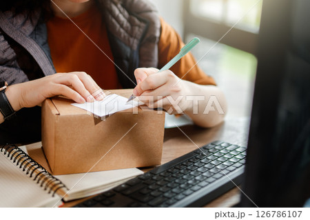 Woman working in a warehouse 126786107