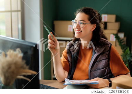 Woman working in a warehouse 126786108