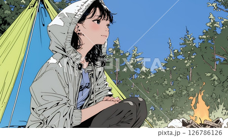 ソロキャンプを楽しんでいる若い女性