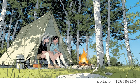 女友達と一緒にテントキャンプを楽しむ若い女性