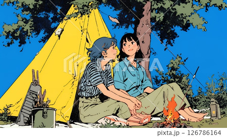 女友達と一緒にテントキャンプを楽しむ若い女性