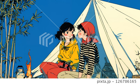 女友達と一緒にテントキャンプを楽しむ若い女性