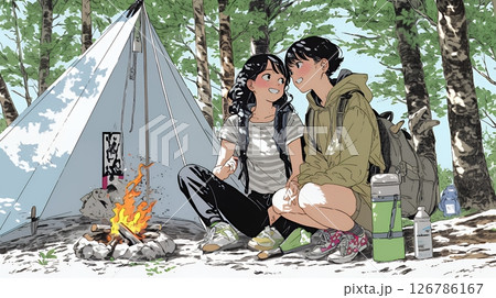 女友達と一緒にテントキャンプを楽しむ若い女性