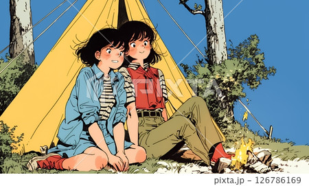 女友達と一緒にテントキャンプを楽しむ若い女性