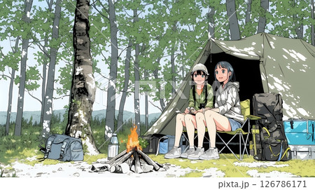女友達と一緒にテントキャンプを楽しむ若い女性