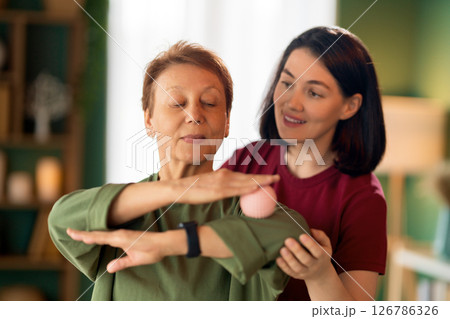 Senior woman doing exercise 126786326