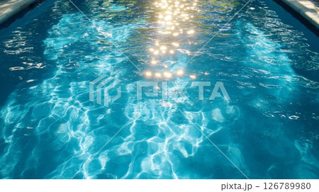 Blue Pool Water with Sunlight Reflections 126789980