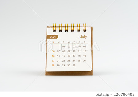 July 2025 Mini desk calendar on white. July 2025 Mini desk calendar on white. 126790405