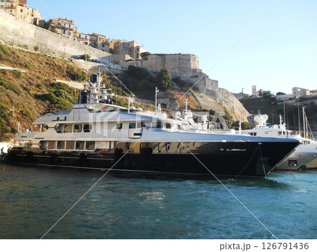 Sea view with boats and beautiful yachts . Corsica. French island. Port Bonifacio. Sea view with boats and beautiful yachts . Corsica. French island. Port Bonifacio. 126791436